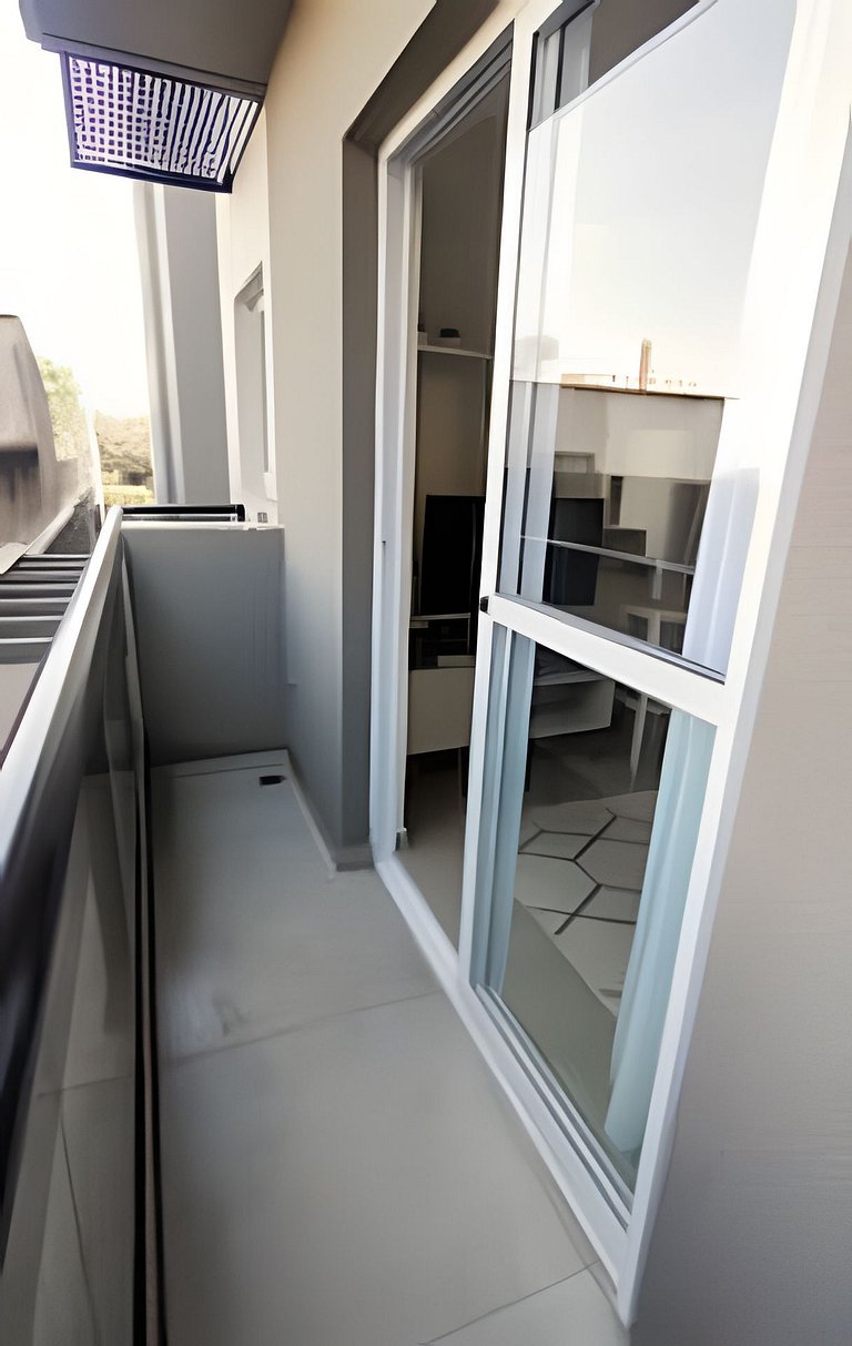 2 quartos com ar e garagem