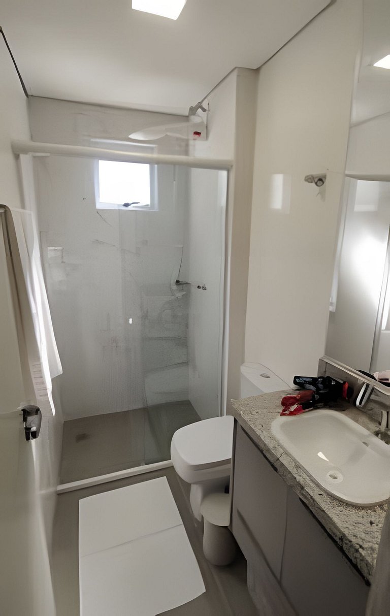2 quartos com ar e garagem