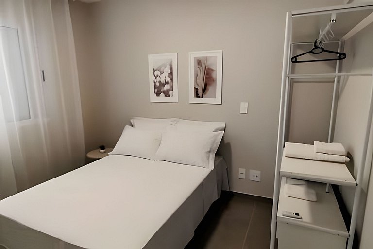 2 quartos com ar e garagem
