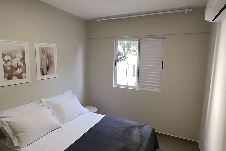 2 quartos com ar e garagem