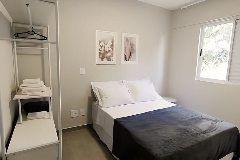 2 quartos com ar e garagem